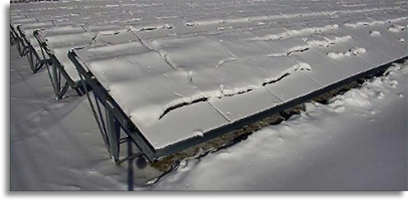 Snow covered solar panels