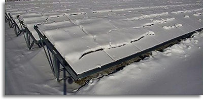 Bifacial solar panels covered in snow